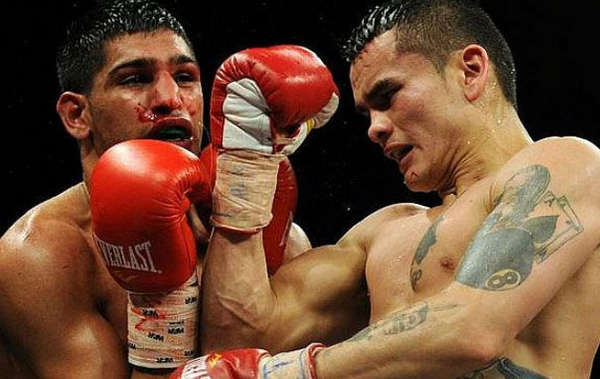 Maidana-castigando-Khan-pelea_OLEIMA20150101_0060_14.jpg